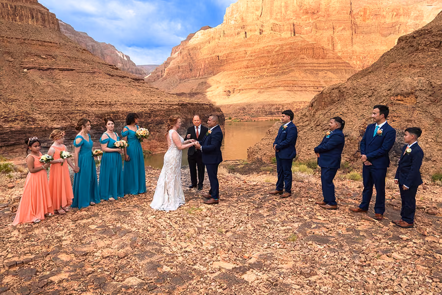 Wedding ceremony with full bridal party at the Grand Canyon below the rim
