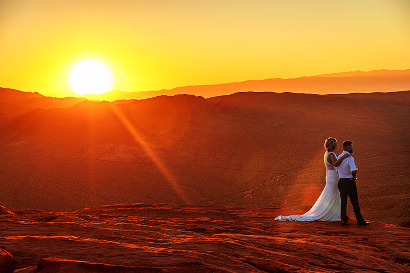 Aerial helicopter wedding Valley of Fire golden hour Nevada desert landscape
