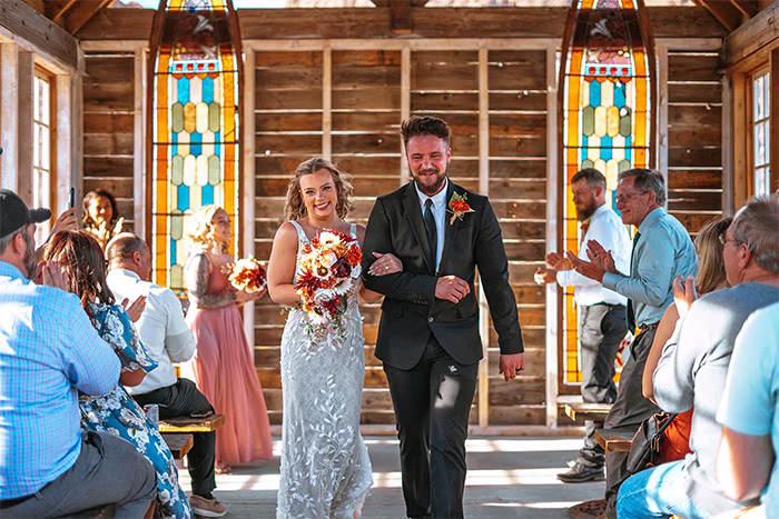 Bride and groom walking out of chapel at Nelson Ghost Town Las Vegas wedding