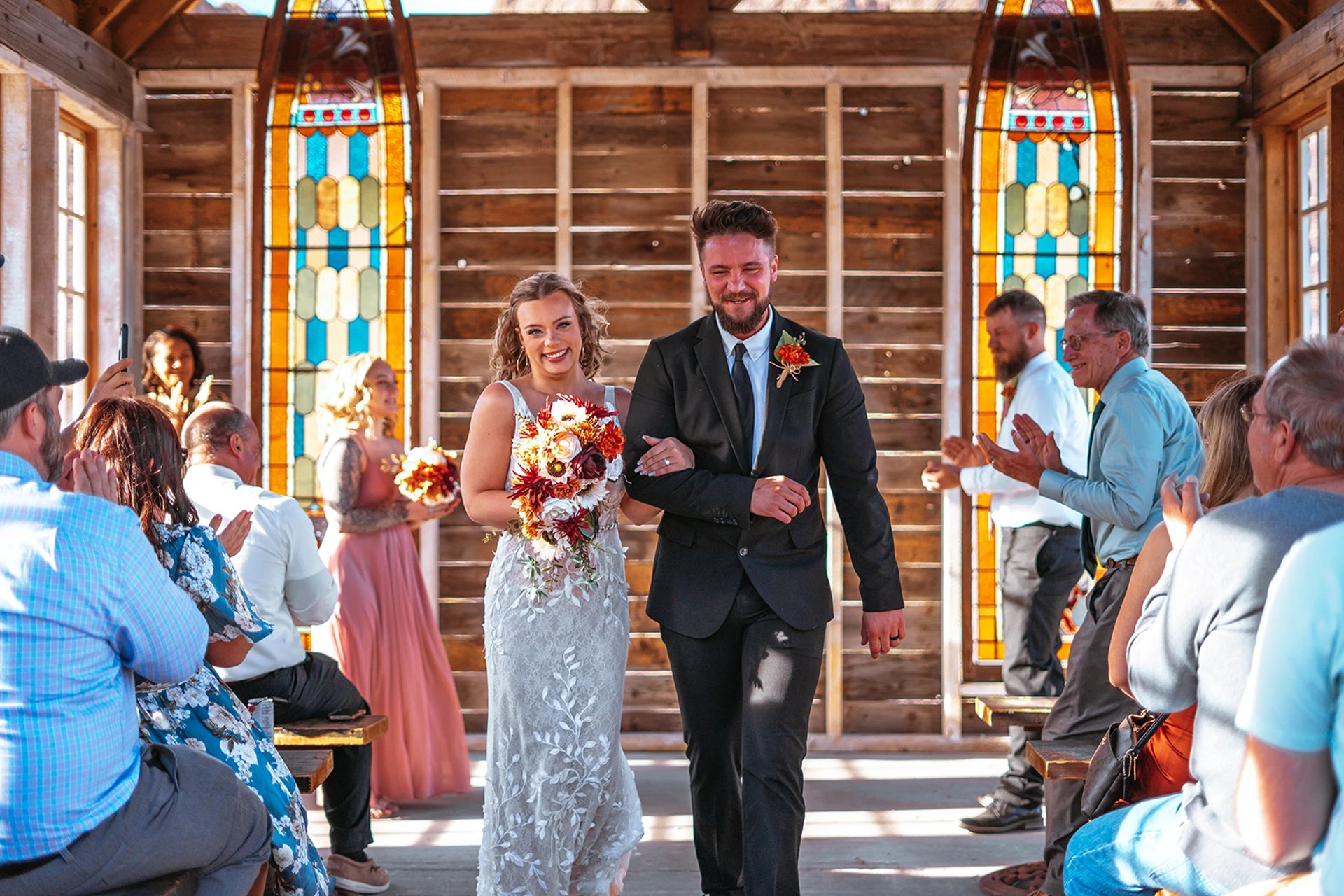 Bride and groom ceremony at Nelson Ghost Town rustic chapel