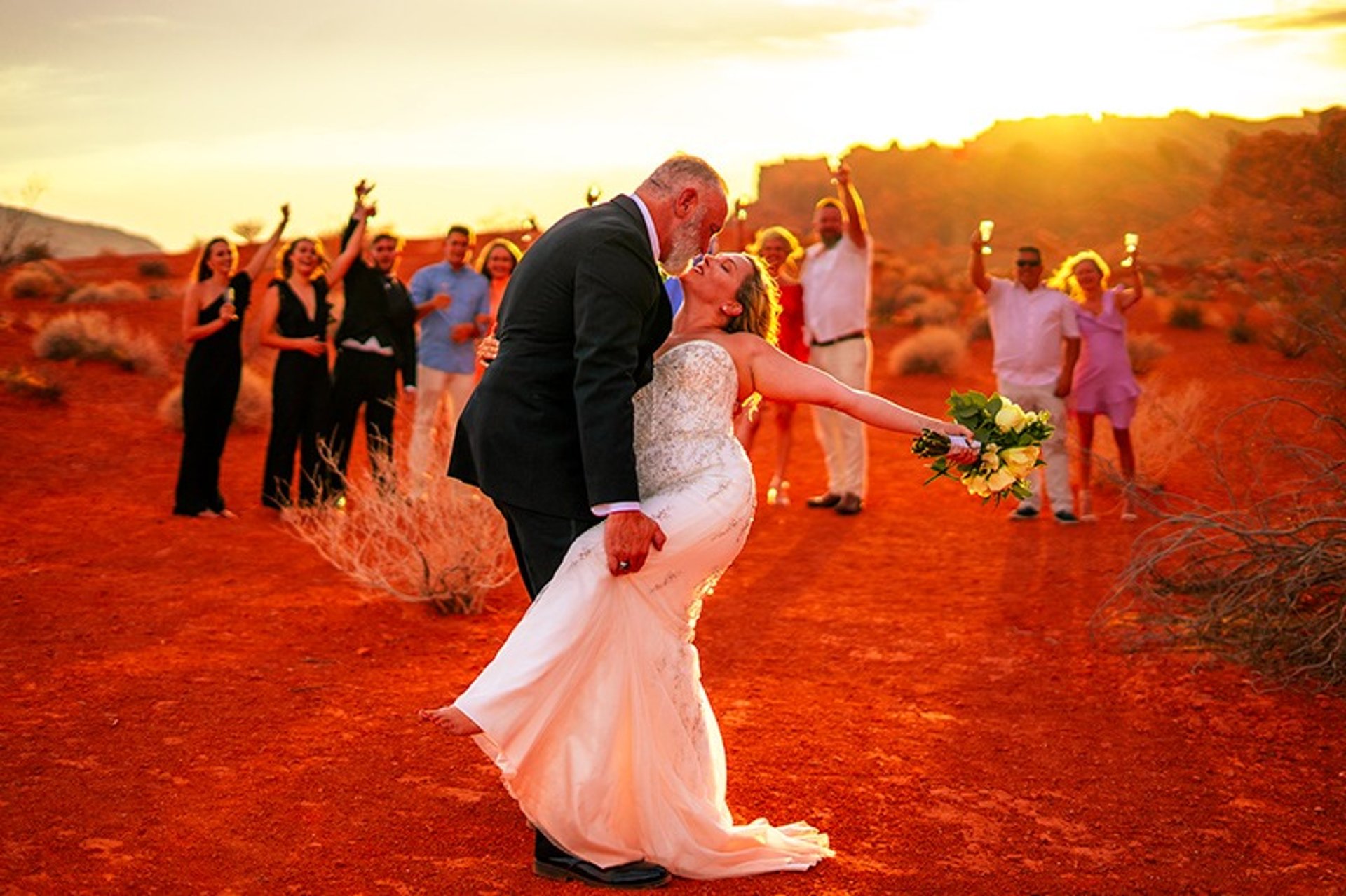 Bride and groom champagne toast at Valley of Fire desert wedding