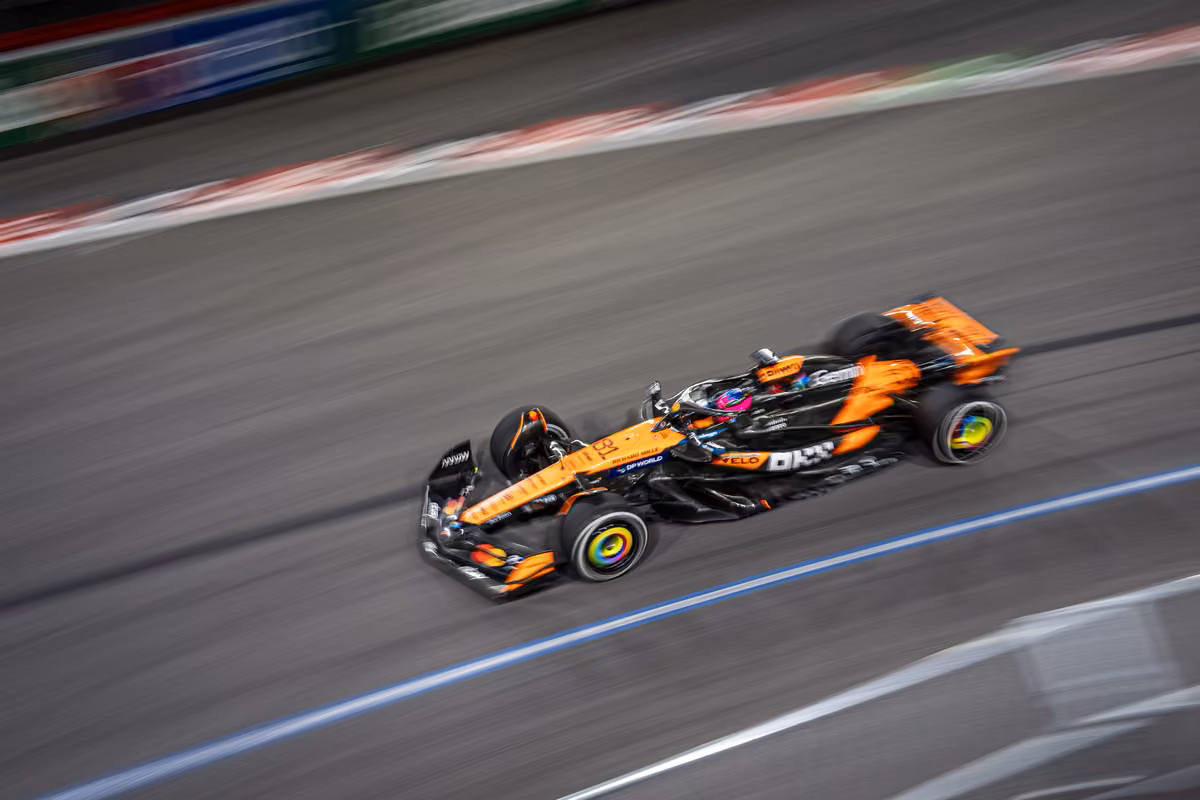 McLaren Formula 1 car at speed during the Las Vegas Grand Prix night race
